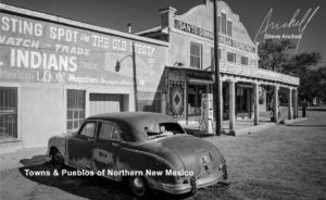 Black and white image of a new mexico gas station with an old car