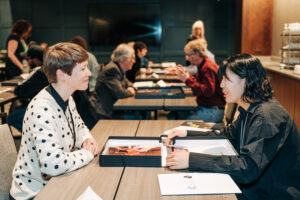 Portfolio review, reviewer and photographer sitting at table